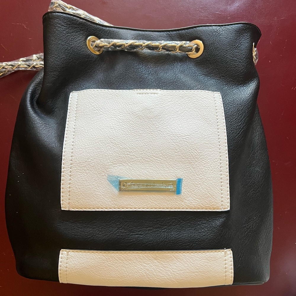 Catherine Malandrino Cream and black backpack